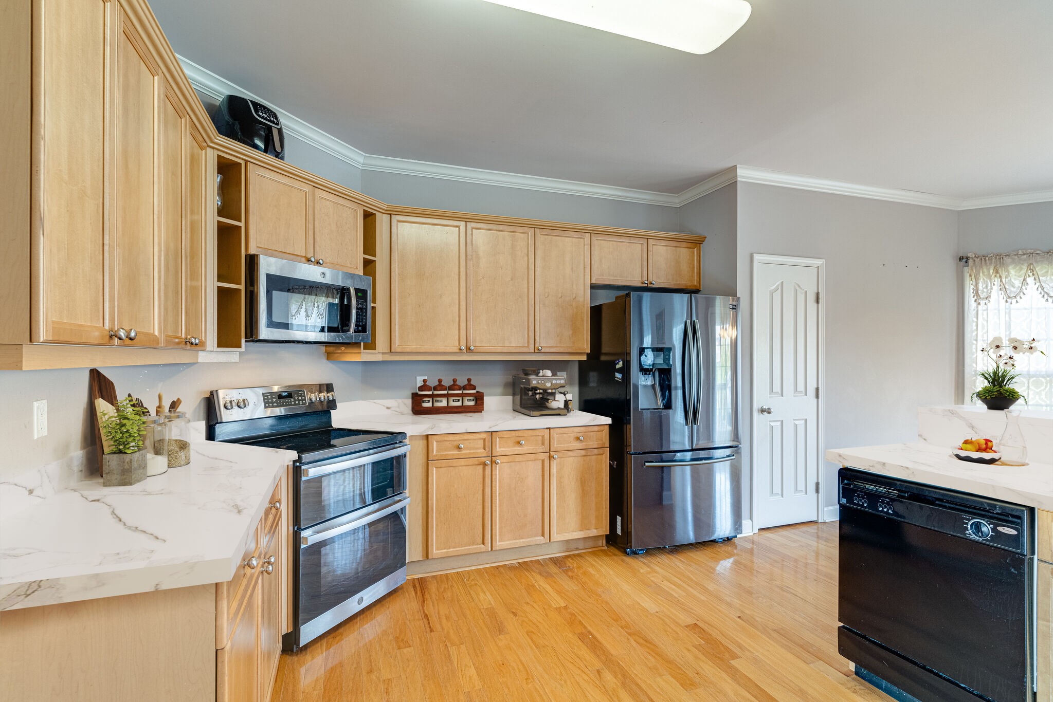 1028 Grider Drive Gallatin, TN 37066 - Photo 15 of 47 a kitchen with a sink cabinets and stainless steel appliances