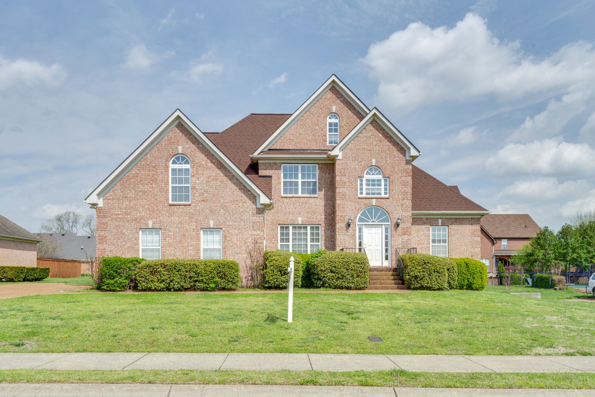 1028 Grider Drive Gallatin, TN 37066 - Photo 2 of 47 a front view of a house with a yard