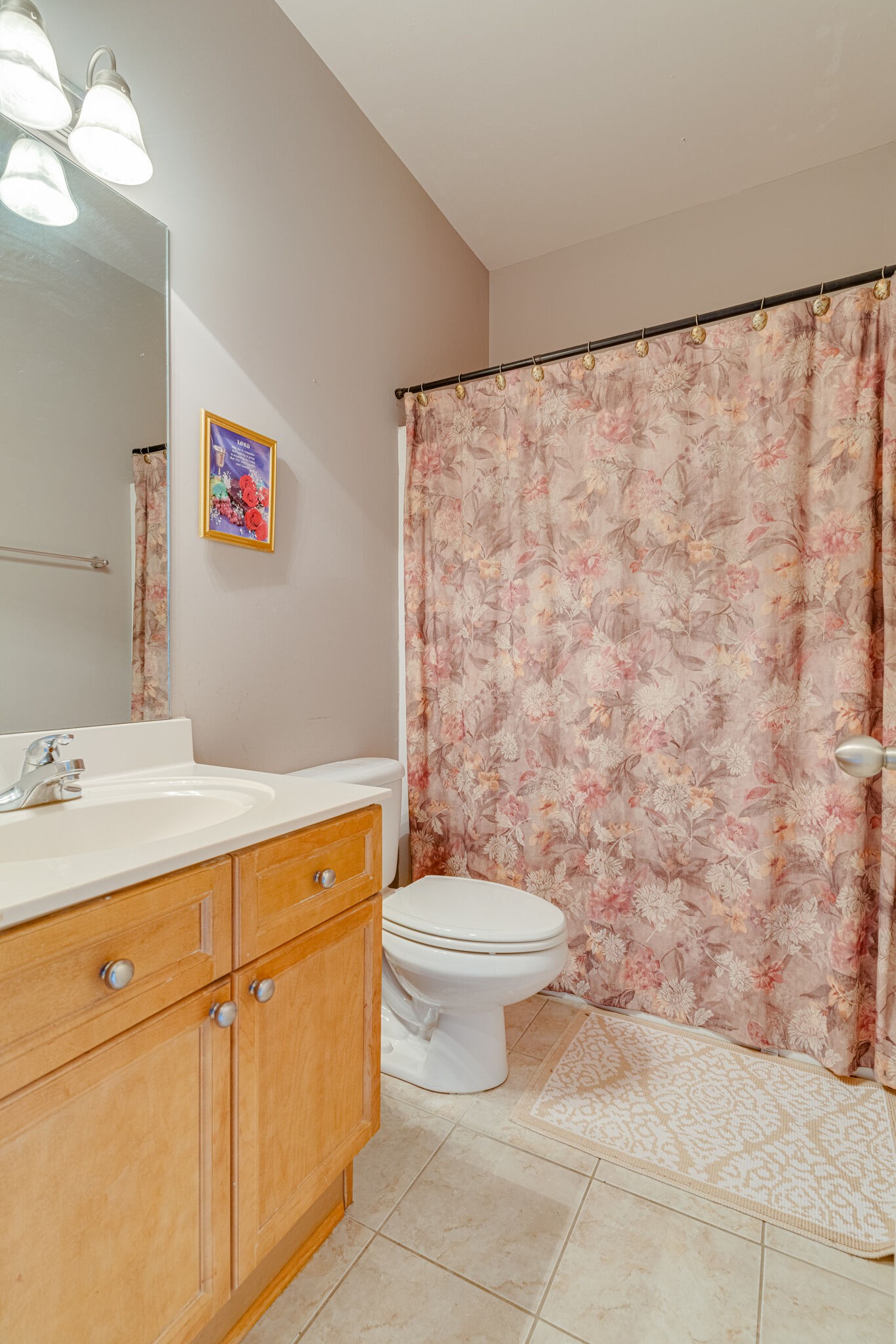1028 Grider Drive Gallatin, TN 37066 - Photo 26 of 47 a bathroom with a toilet a sink and a shower