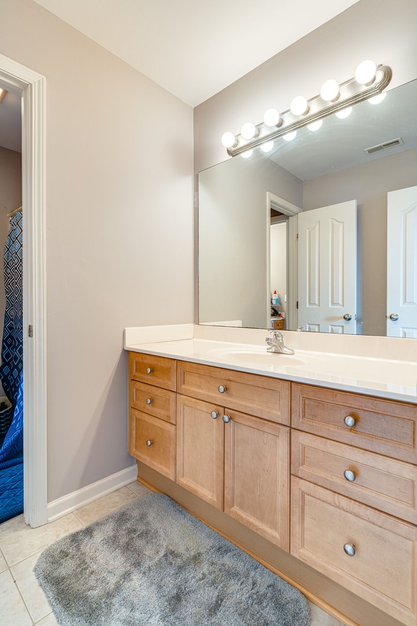 1028 Grider Drive Gallatin, TN 37066 - Photo 33 of 47 a bathroom with a sink and a mirror