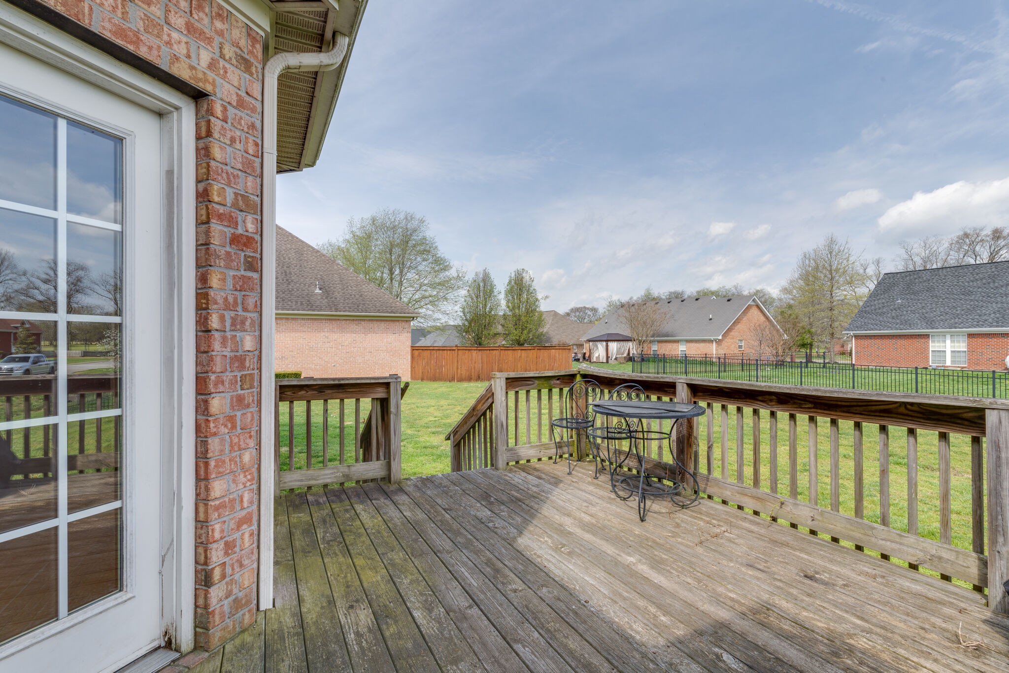1028 Grider Drive Gallatin, TN 37066 - Photo 43 of 47 a balcony with furniture and wooden floor
