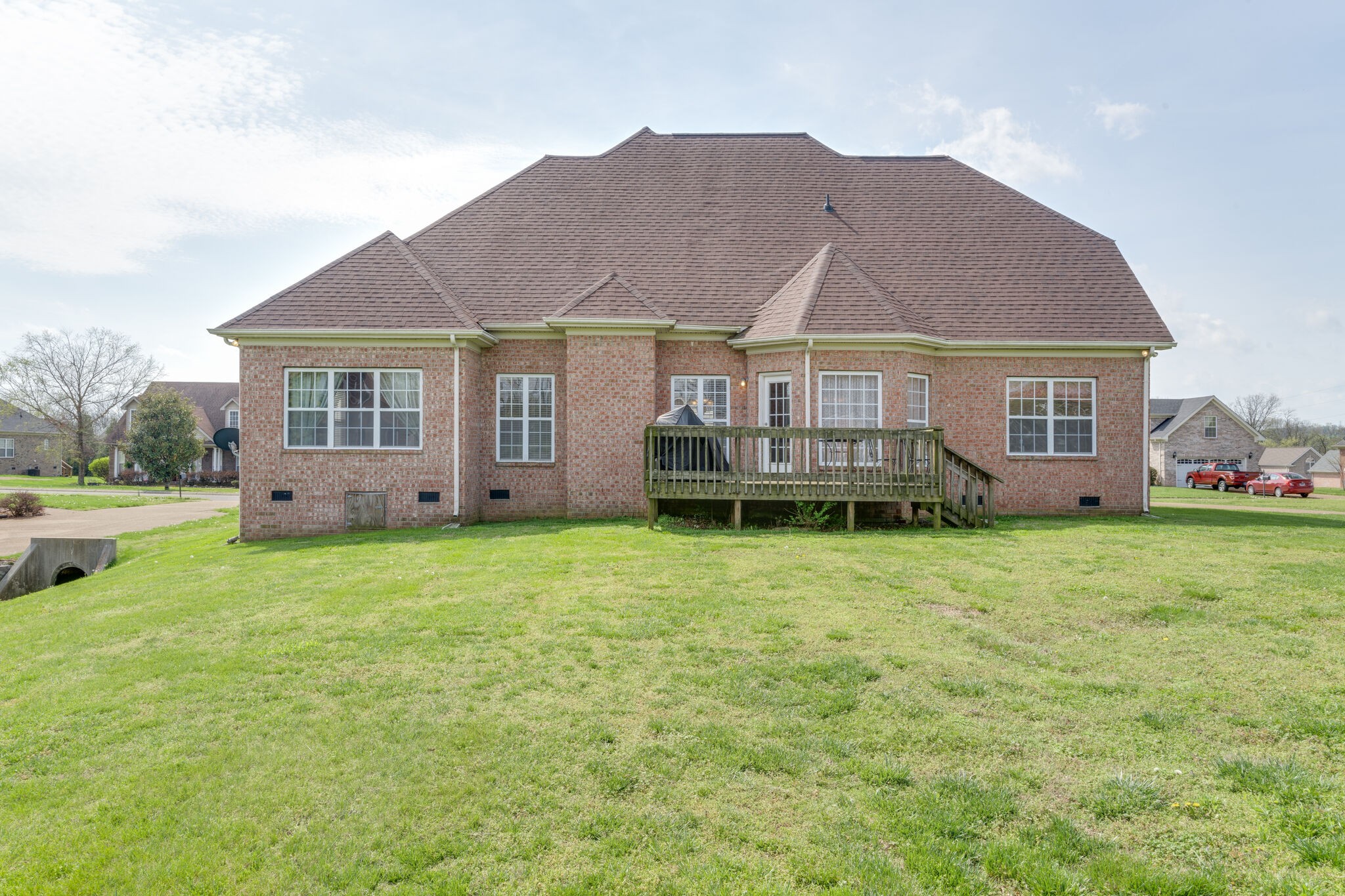 1028 Grider Drive Gallatin, TN 37066 - Photo 45 of 47 a view of a house with a backyard and porch