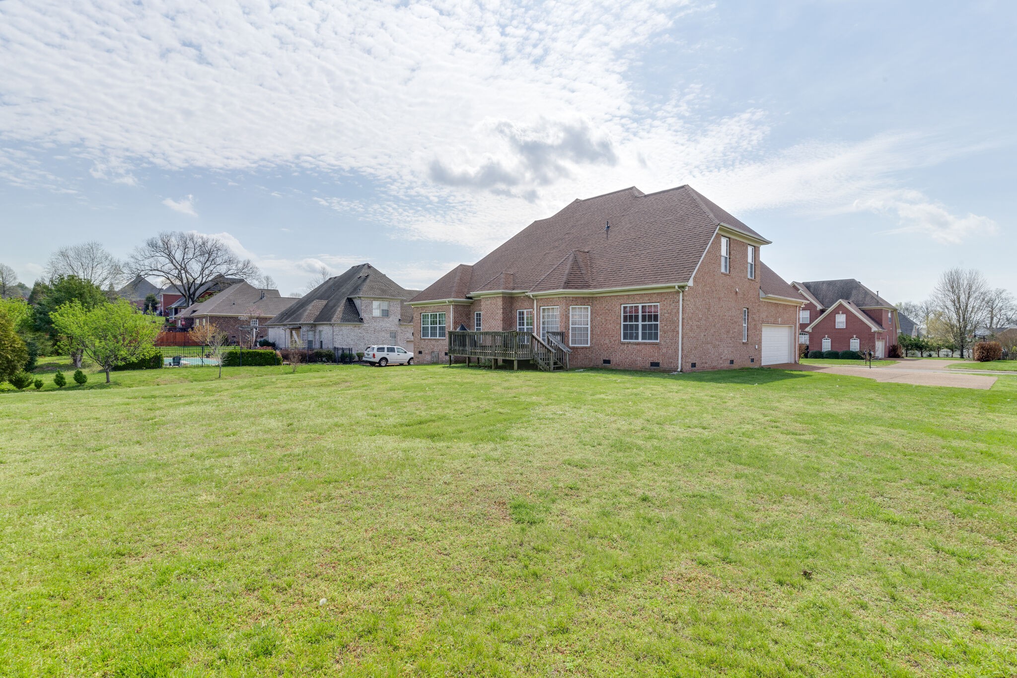 1028 Grider Drive Gallatin, TN 37066 - Photo 46 of 47 a view of a house with a big yard and large trees