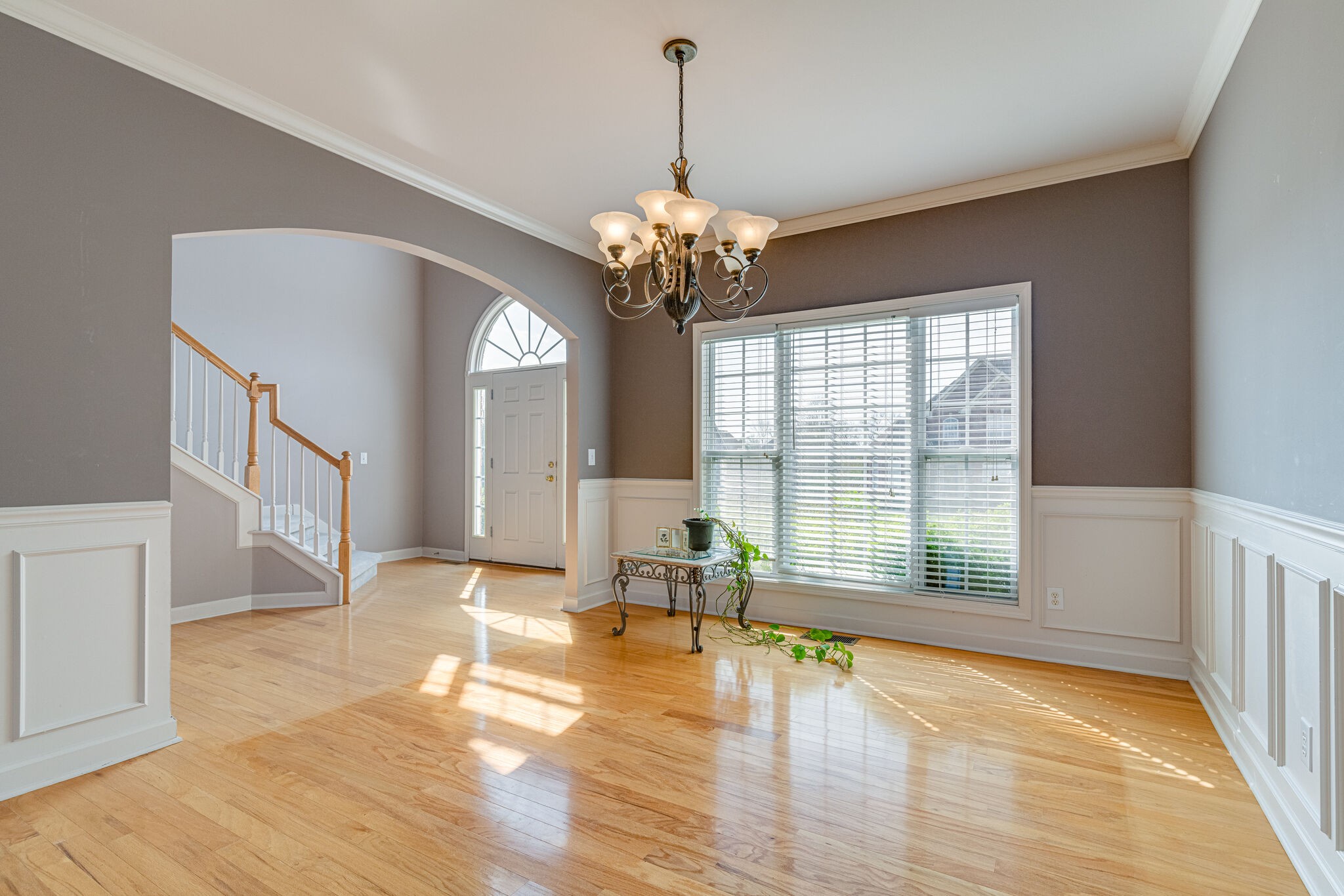 1028 Grider Drive Gallatin, TN 37066 - Photo 8 of 47 a living room with furniture and a chandelier