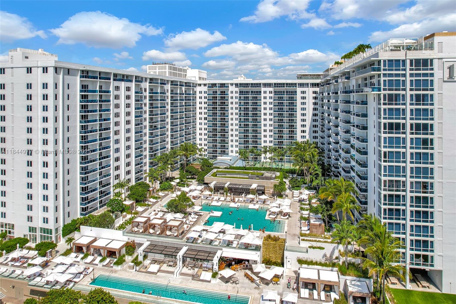 2301 Collins Avenue, Unit 1201 Miami Beach, FL 33139 - Photo 41 of 53 a view of a city with tall buildings