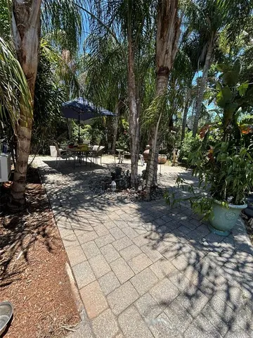 a view of backyard with green space