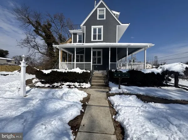 a front view of a house with yard
