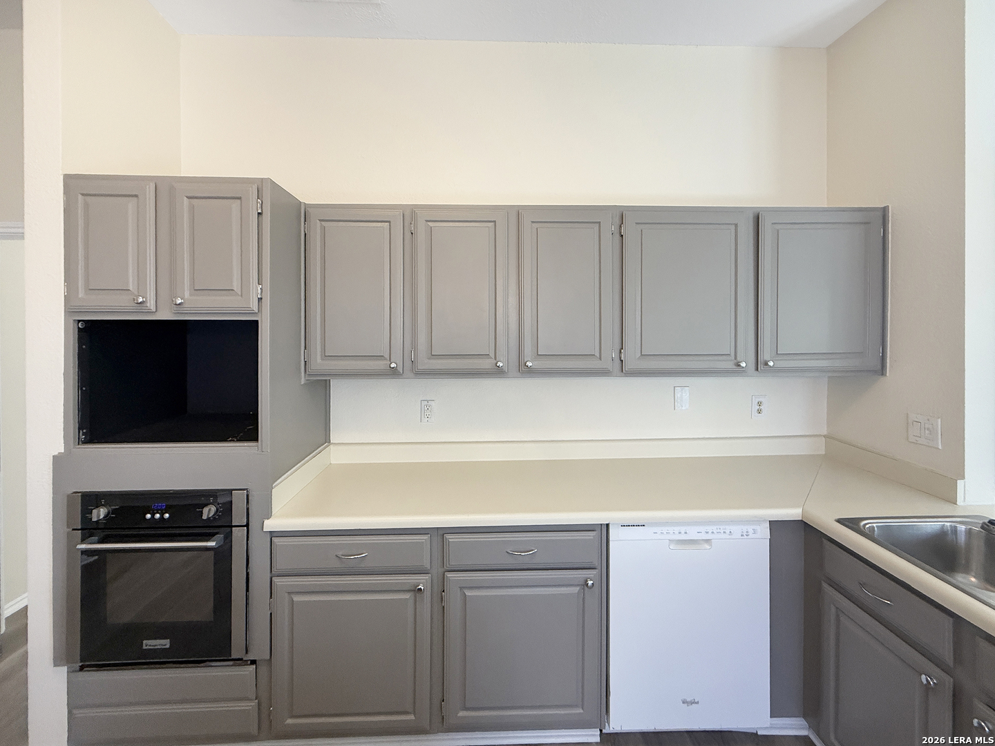 9808 Delta Ridge Drive Converse, TX 78109 - Photo 25 of 38 a kitchen with a sink and cabinets