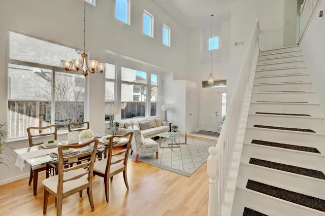a very nice looking dining room with a table and chairs