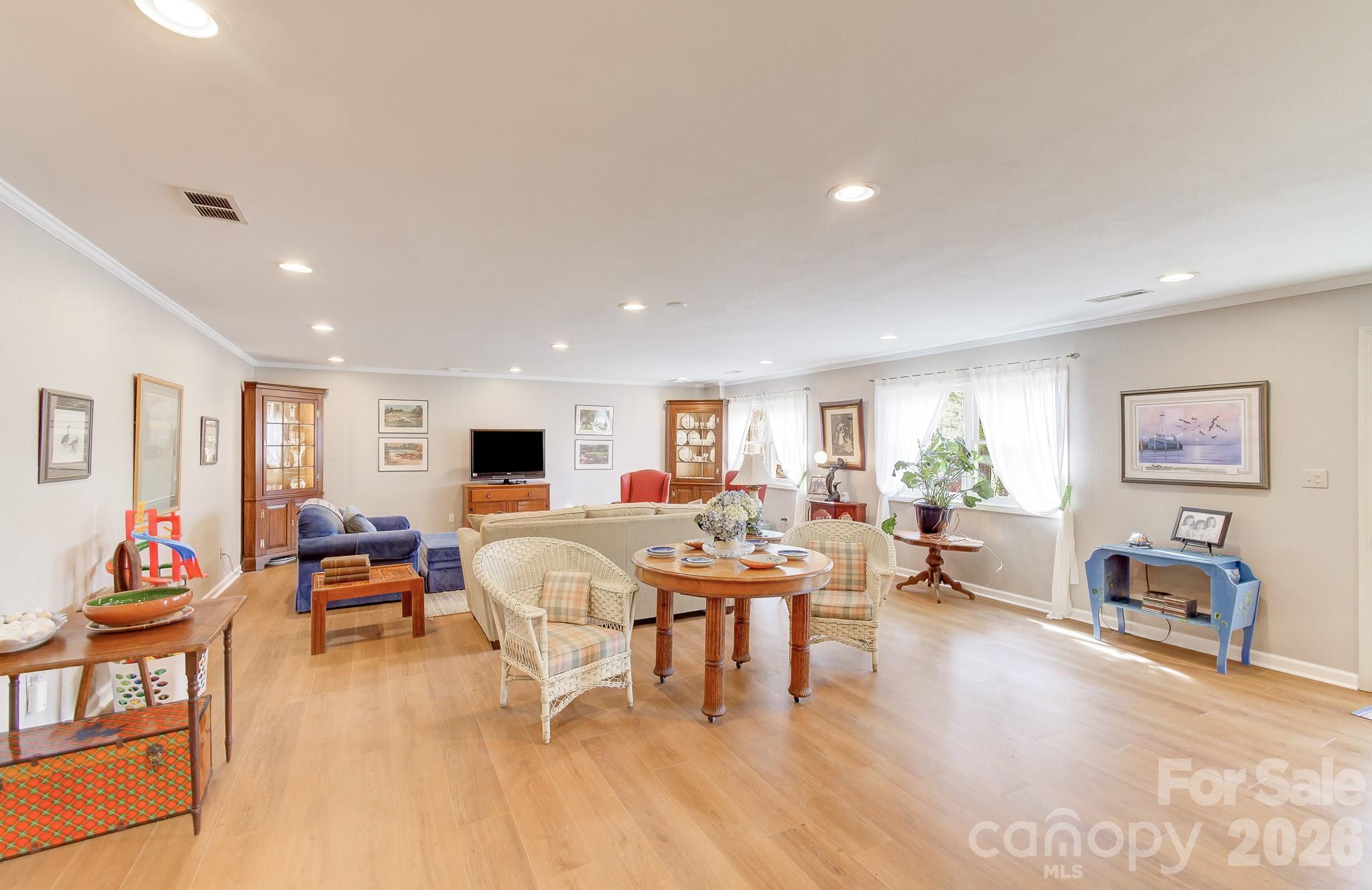 737 Woodbine Road Waynesville, NC 28785 - Photo 40 of 48 a living room with furniture and wooden floor