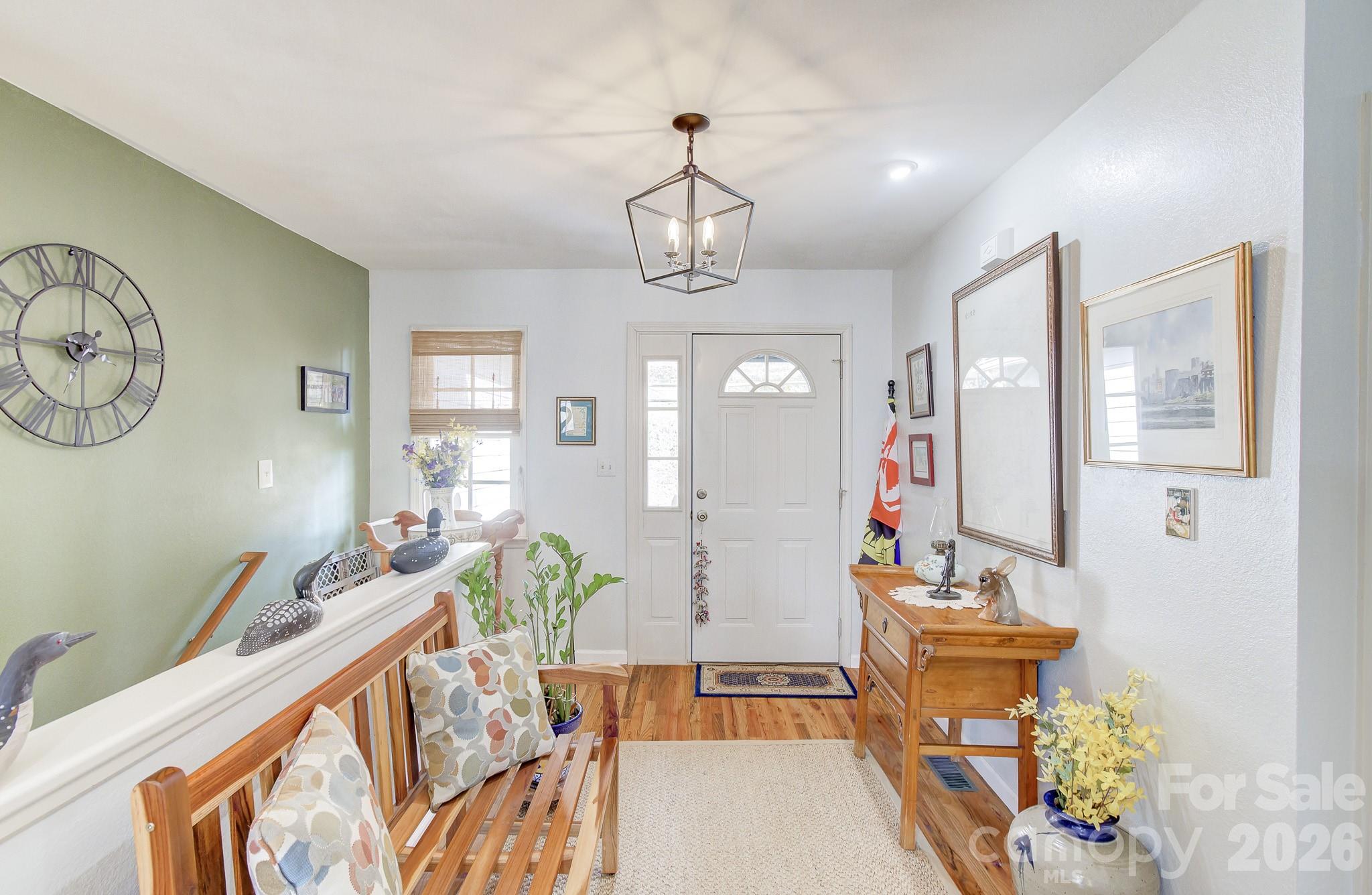 737 Woodbine Road Waynesville, NC 28785 - Photo 4 of 48 a view of a living room and dining room