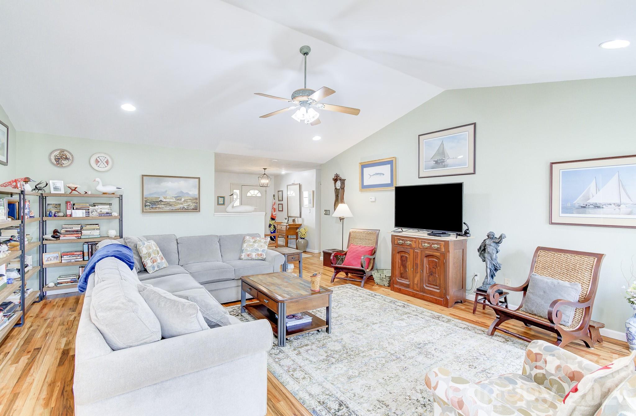 737 Woodbine Road Waynesville, NC 28785 - Photo 8 of 48 a living room with furniture and a flat screen tv