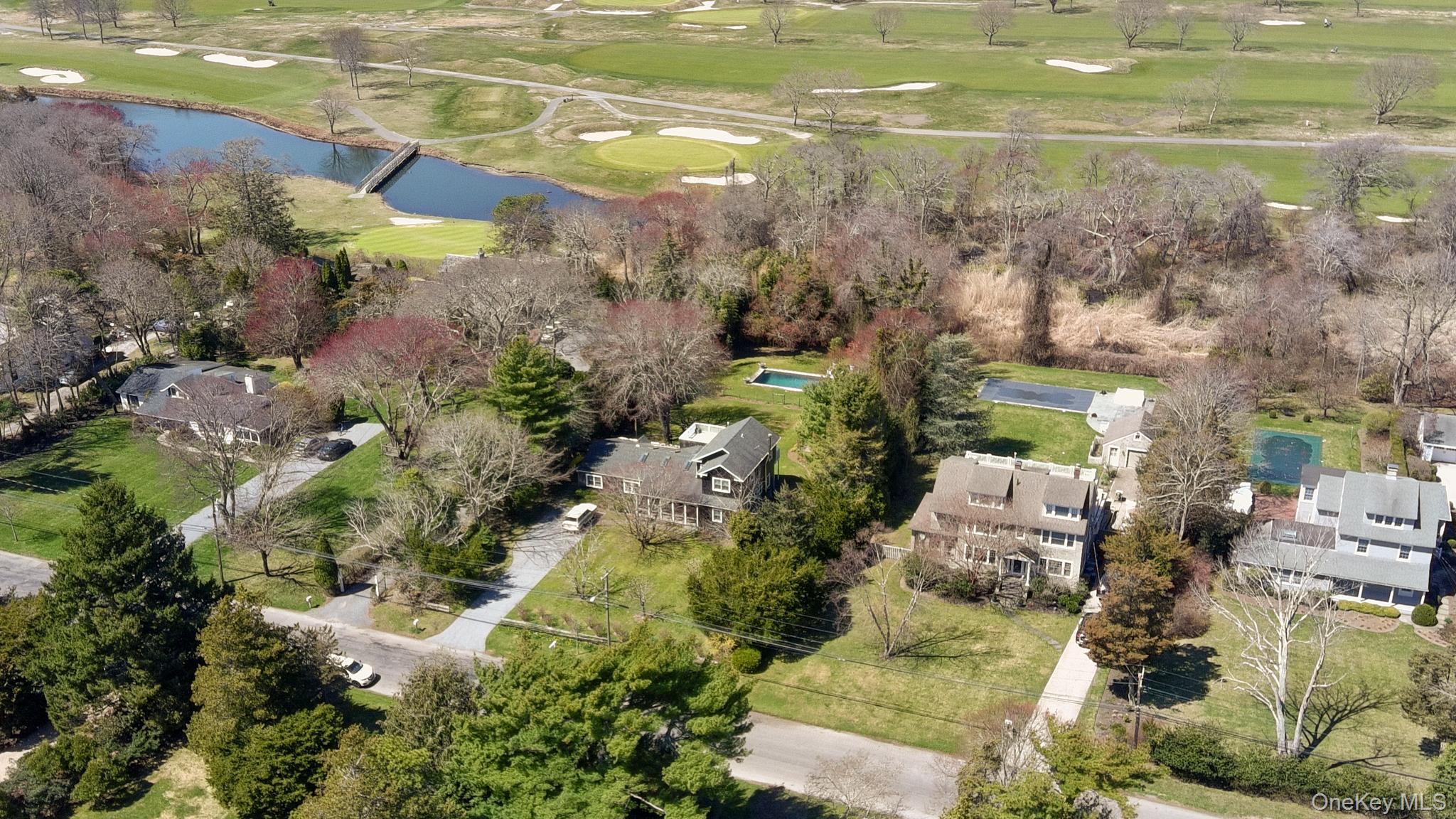36 South Howells Point Road Bellport, NY 11713 - Photo 25 of 29 an aerial view of residential houses with outdoor space