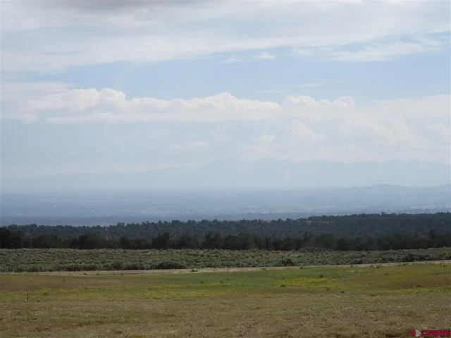 a view of mountain with lake view