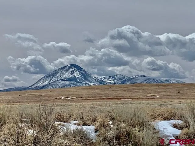 a view of a lake with a mountain