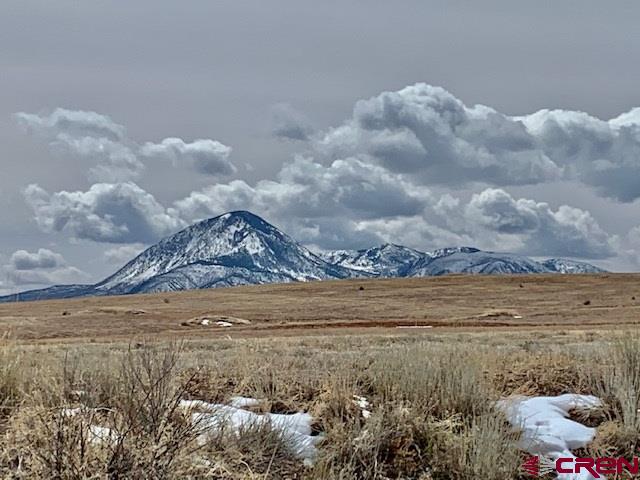 Lot 12 Road 17.9 Cortez Co 81321 Cortez, CO 81321 - Photo 18 of 21 a view of a lake with a mountain
