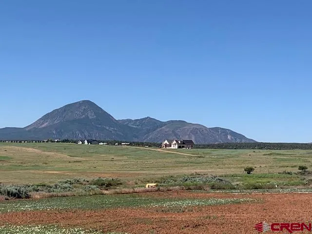 a view of a lake with a mountain