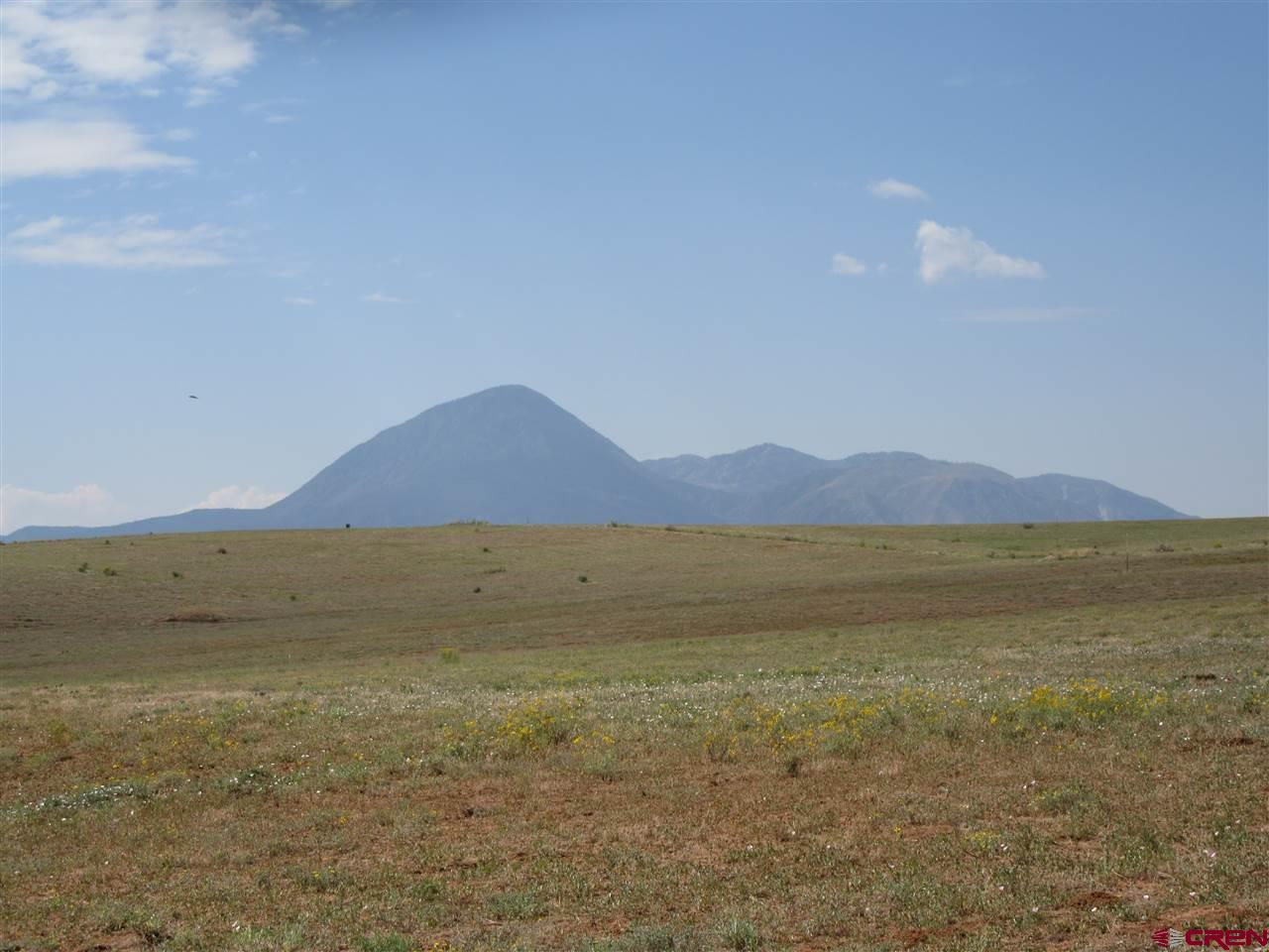 Lot 12 Road 17.9 Cortez Co 81321 Cortez, CO 81321 - Photo 4 of 21 a view of an ocean and a mountain