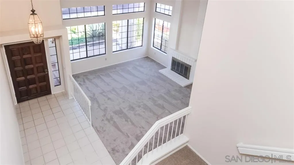 14662 Silverset Street Poway, CA 92064 - Photo 14 of 25 a view of an empty room and wooden floor
