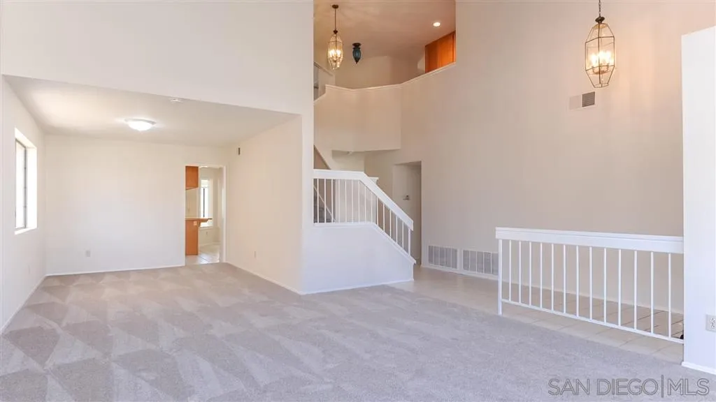 14662 Silverset Street Poway, CA 92064 - Photo 3 of 25 a view of an empty room with stairs