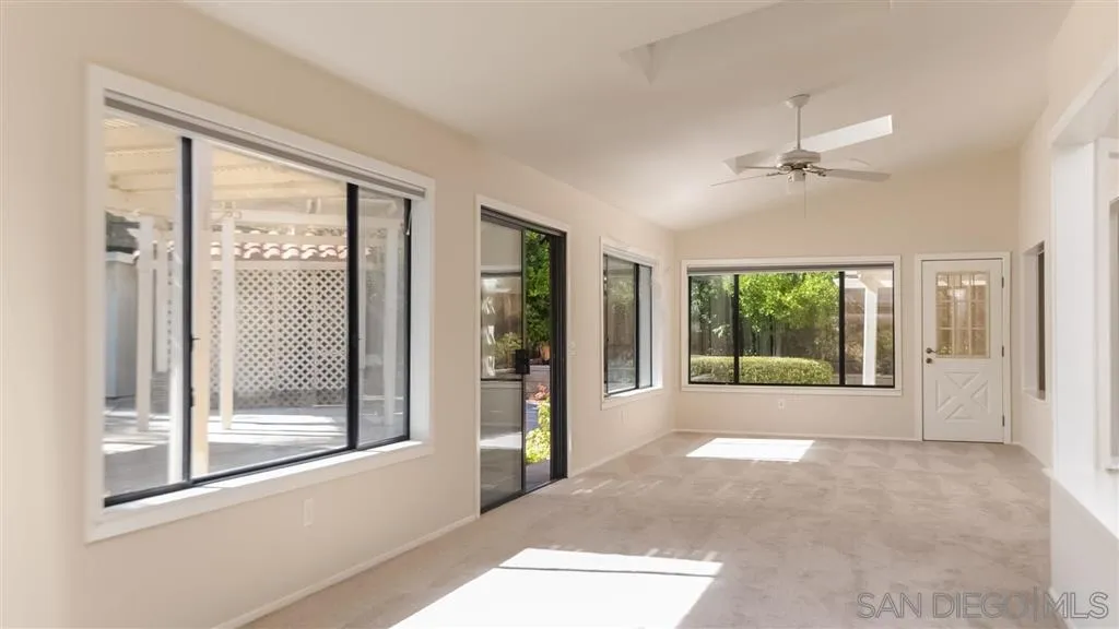 14662 Silverset Street Poway, CA 92064 - Photo 9 of 25 a view of livingroom with furniture wooden floor and fan