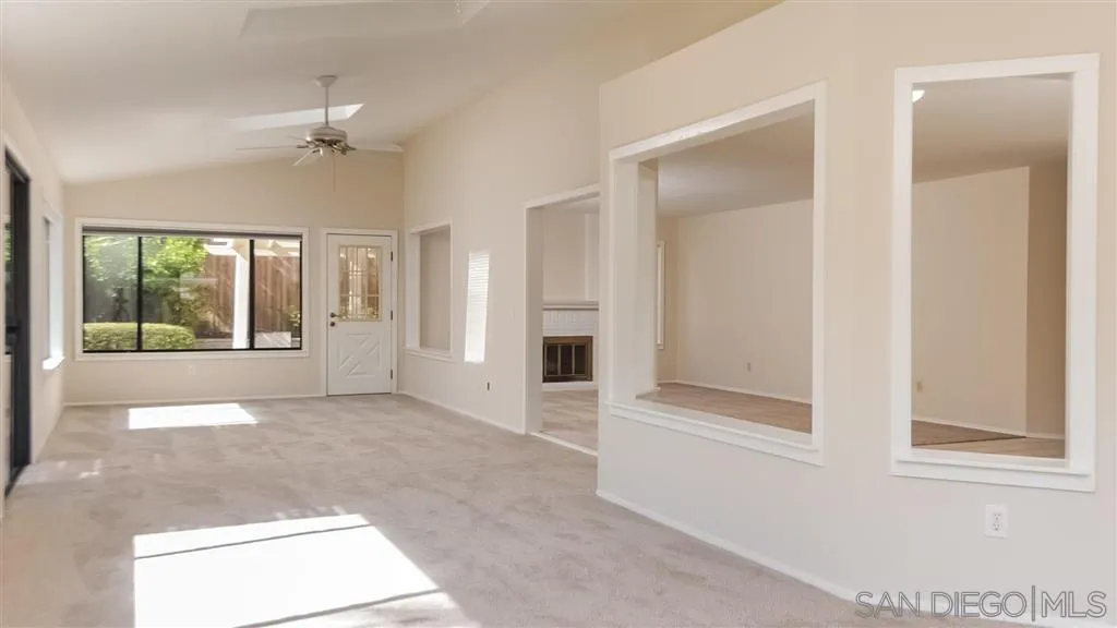14662 Silverset Street Poway, CA 92064 - Photo 10 of 25 a view of an empty room with a window