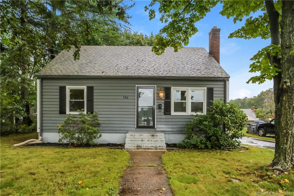 188 Broad Street Manchester, CT 06042 - Photo 1 of 1 a front view of a house with garden