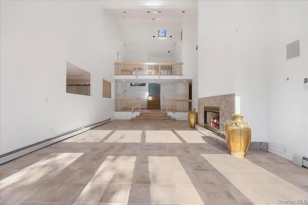 a view of livingroom with furniture and fireplace