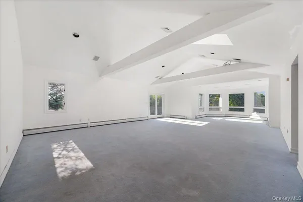 a view of livingroom with floor to ceiling window