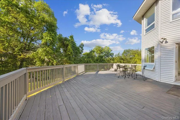 a view of deck and a garden