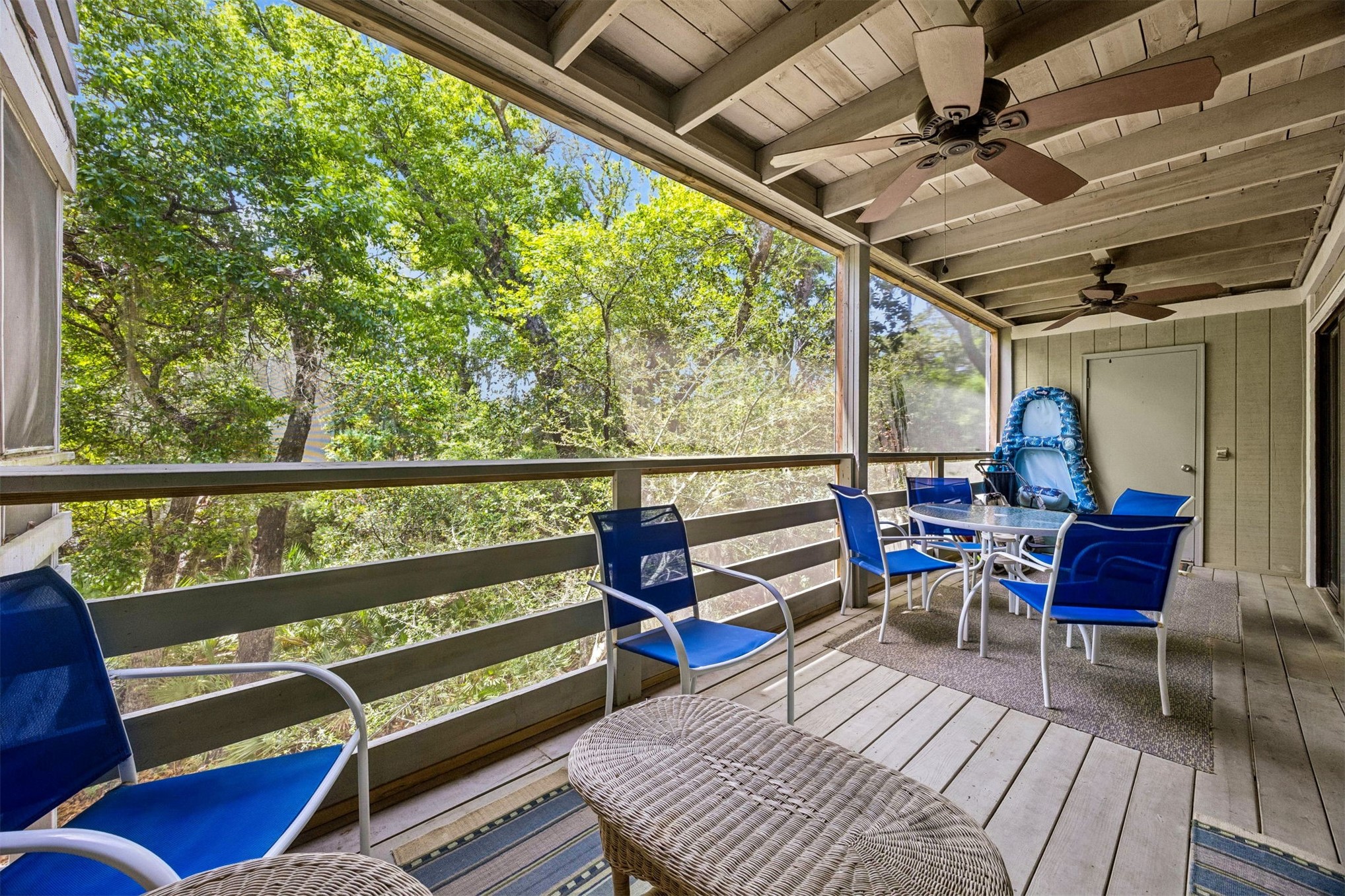 2328 Sadler Road, Unit 1C Fernandina Beach, FL 32034 - Photo 32 of 49 a view of a chairs in wooden deck