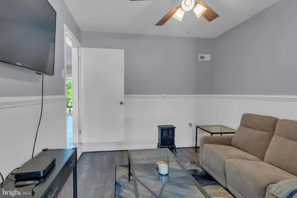 a living room with furniture and a couch