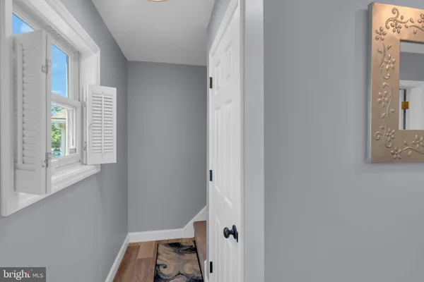 a view of a room that has a window in it