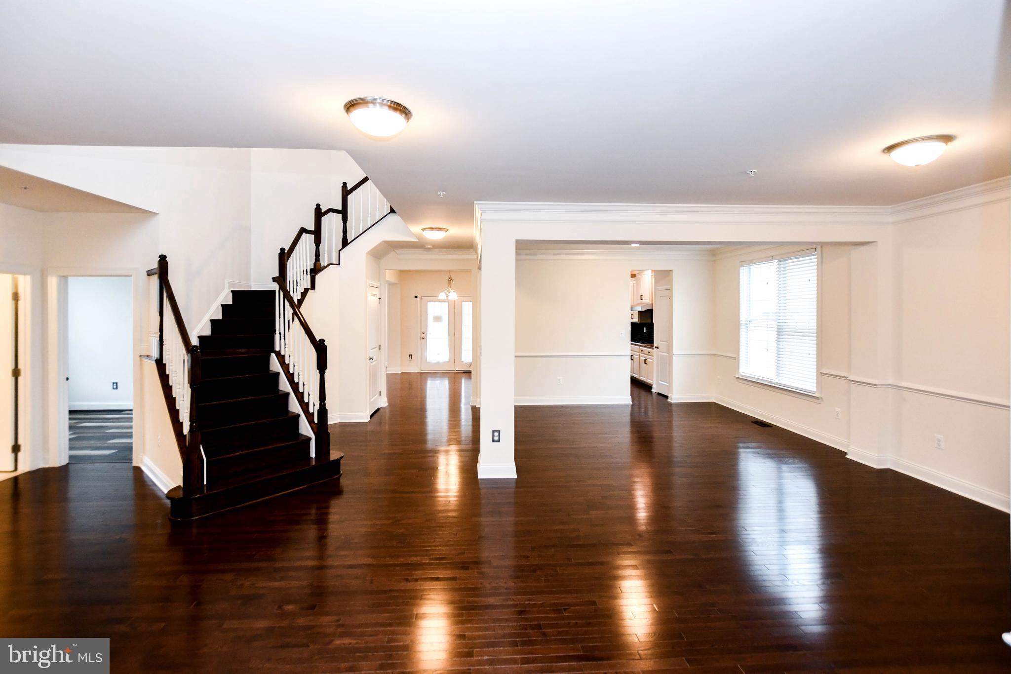 1610 Stream Valley Overlook Severn, MD 21144 - Photo 11 of 86 a view of an entryway with wooden floor