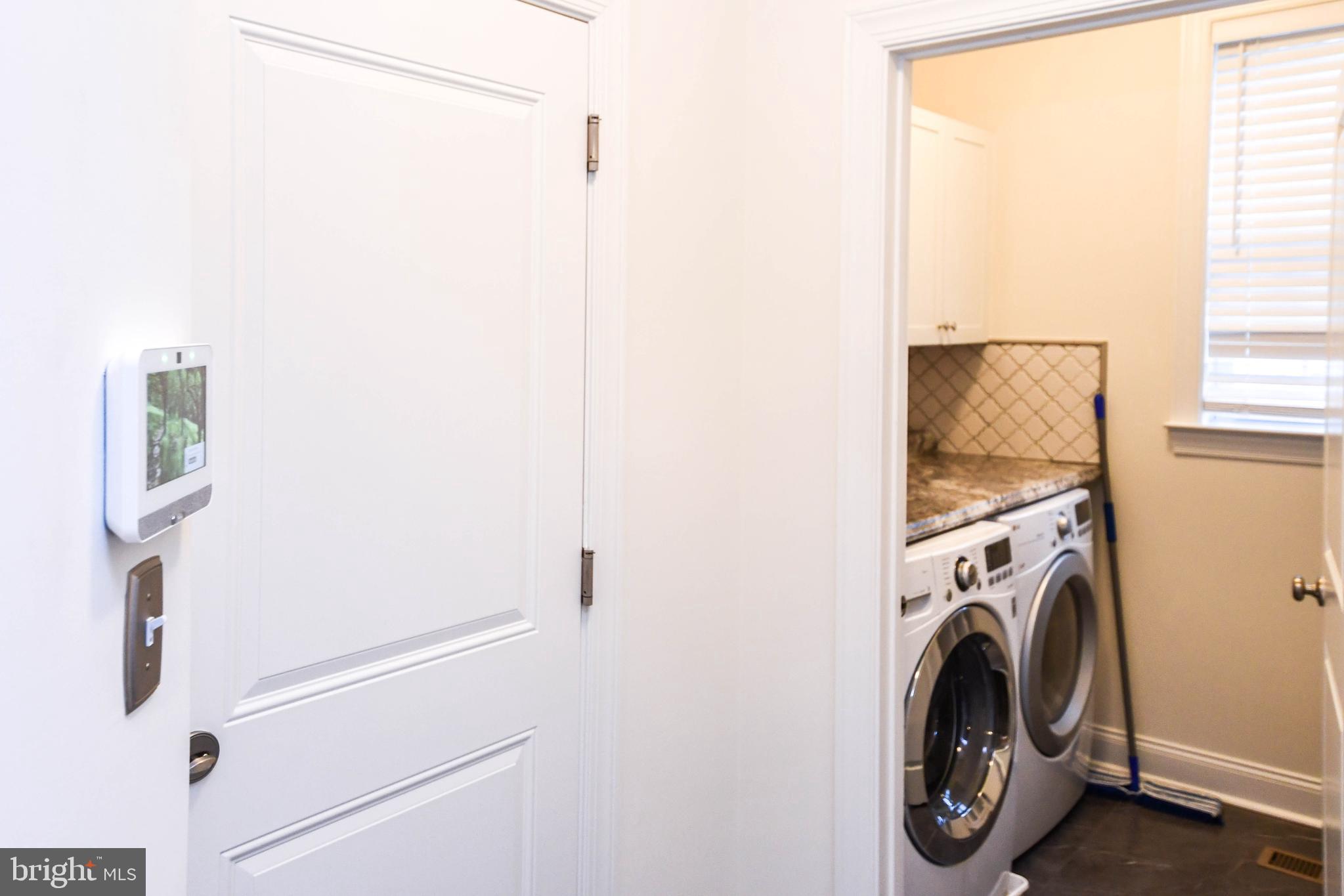 1610 Stream Valley Overlook Severn, MD 21144 - Photo 25 of 86 a utility room with dryer and washer