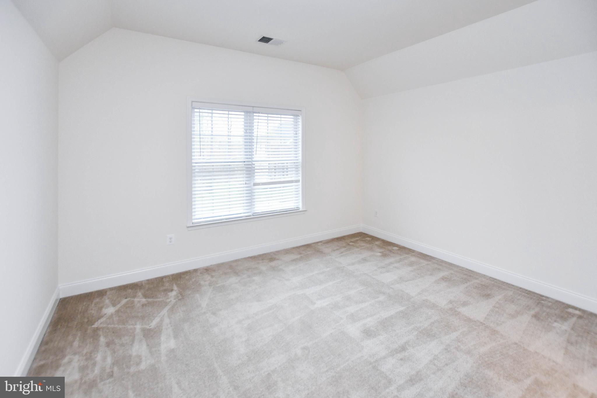 1610 Stream Valley Overlook Severn, MD 21144 - Photo 31 of 86 an empty room with a window