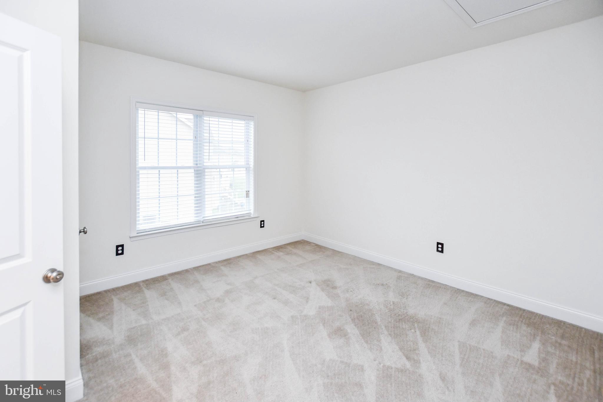 1610 Stream Valley Overlook Severn, MD 21144 - Photo 38 of 86 an empty room with a window