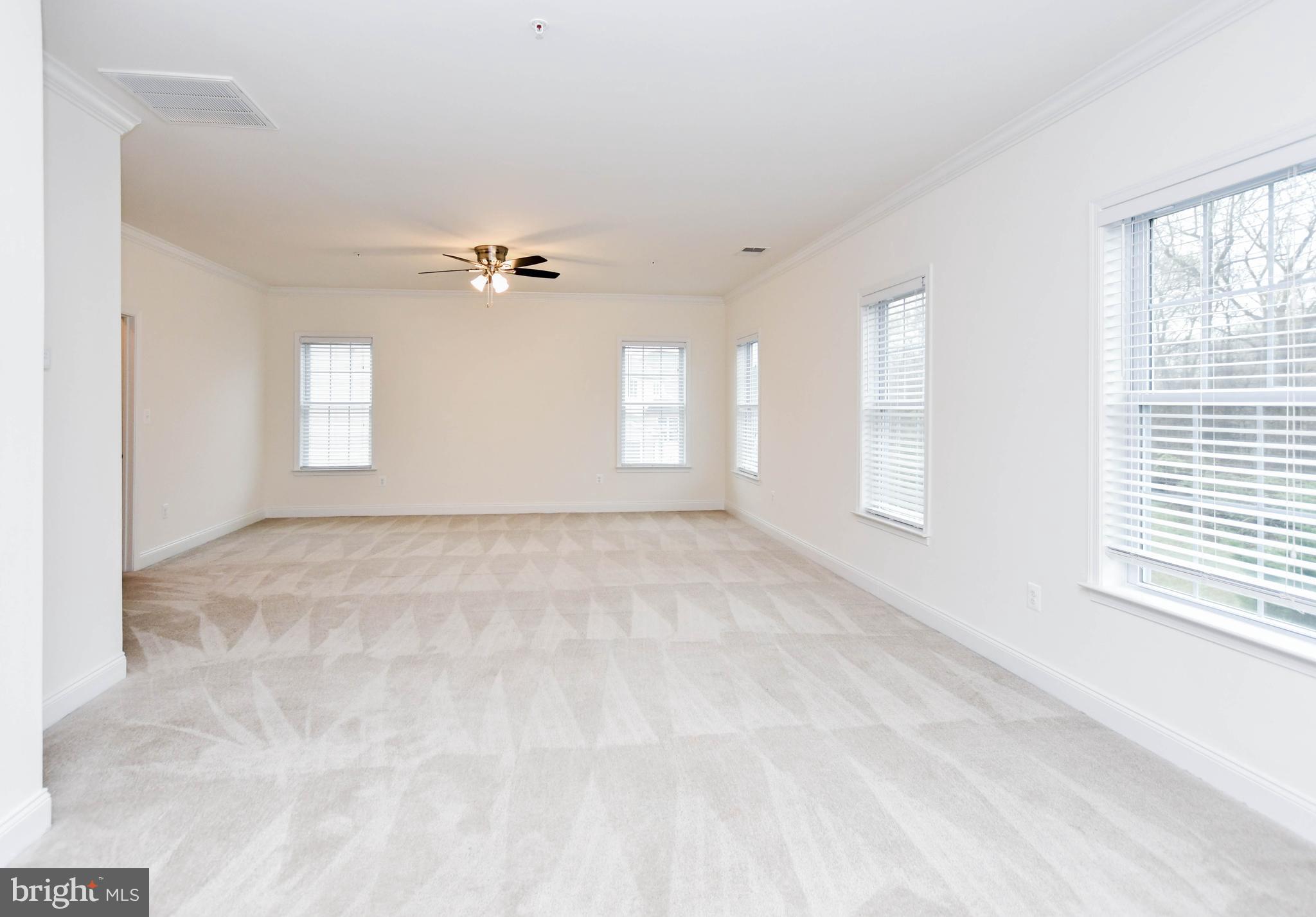 1610 Stream Valley Overlook Severn, MD 21144 - Photo 55 of 86 a view of an empty room with a window