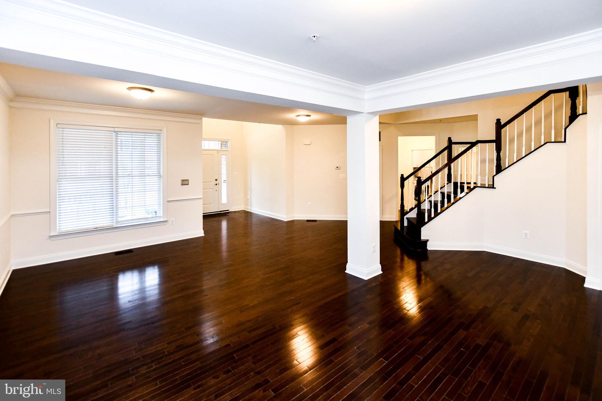 1610 Stream Valley Overlook Severn, MD 21144 - Photo 63 of 86 a view of an entryway with wooden floor