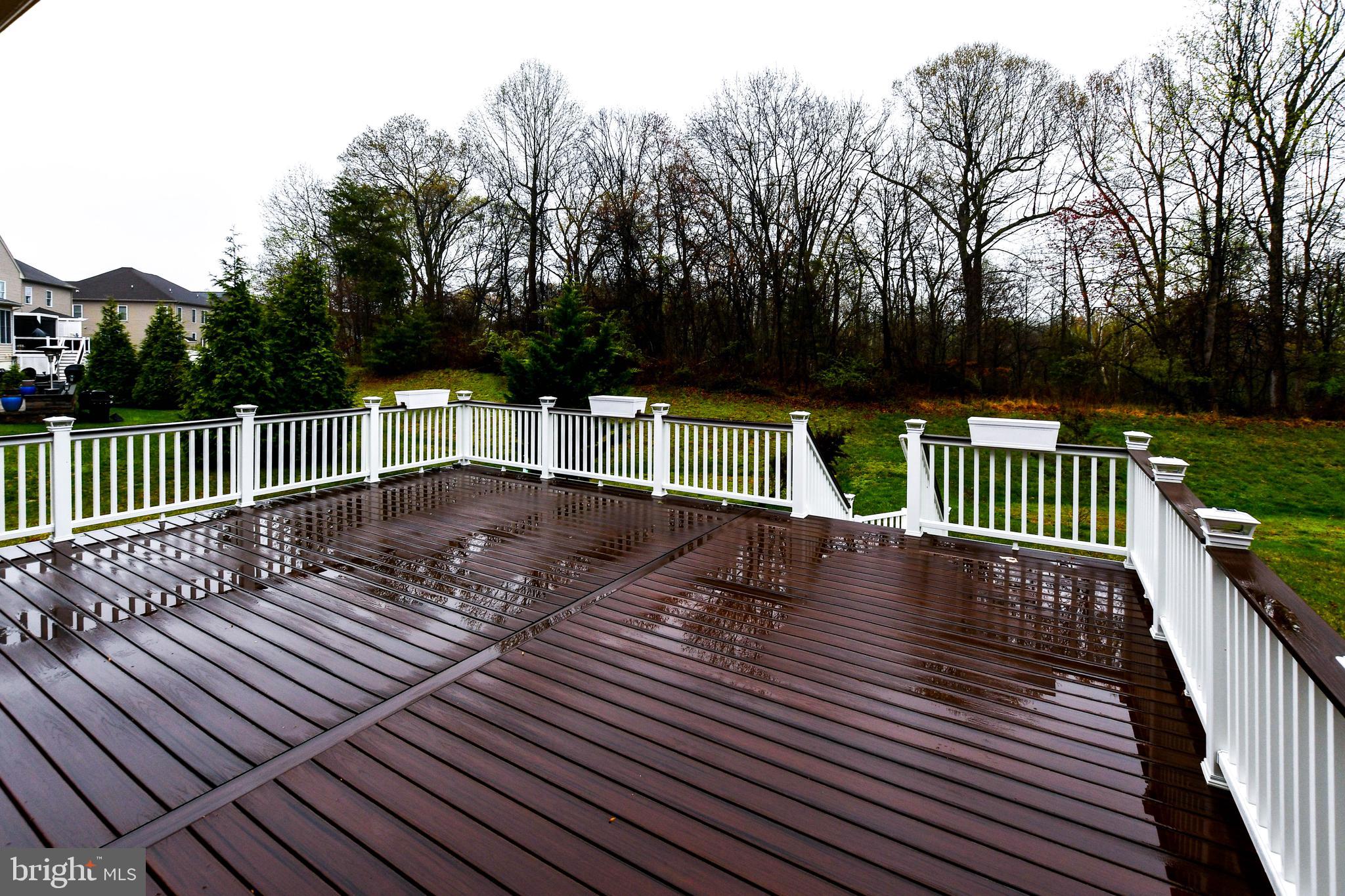 1610 Stream Valley Overlook Severn, MD 21144 - Photo 74 of 86 a view of backyard with deck