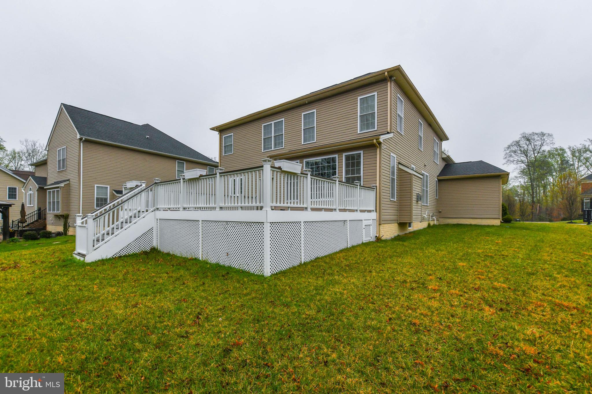 1610 Stream Valley Overlook Severn, MD 21144 - Photo 77 of 86 a front view of house with yard and garage