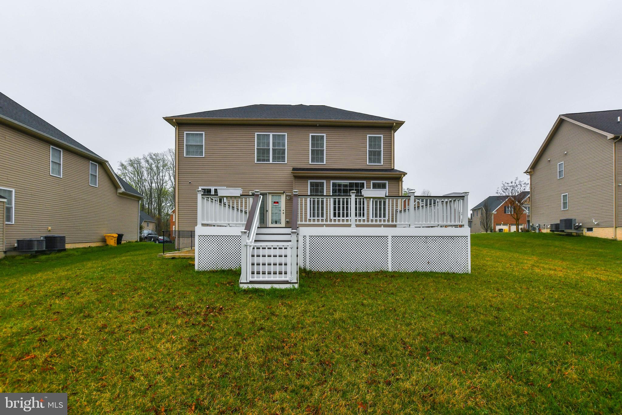 1610 Stream Valley Overlook Severn, MD 21144 - Photo 79 of 86 a front view of a house with a garden