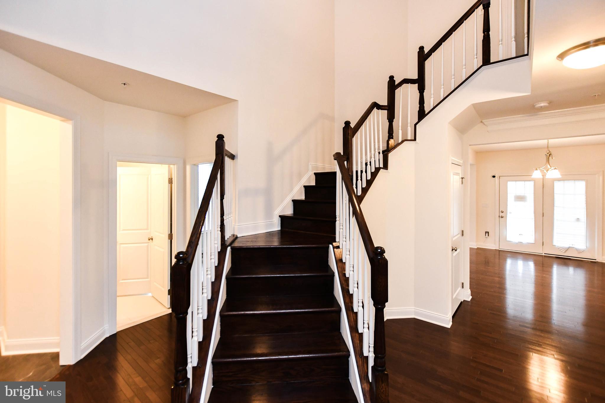 1610 Stream Valley Overlook Severn, MD 21144 - Photo 9 of 86 Staircase front entrance