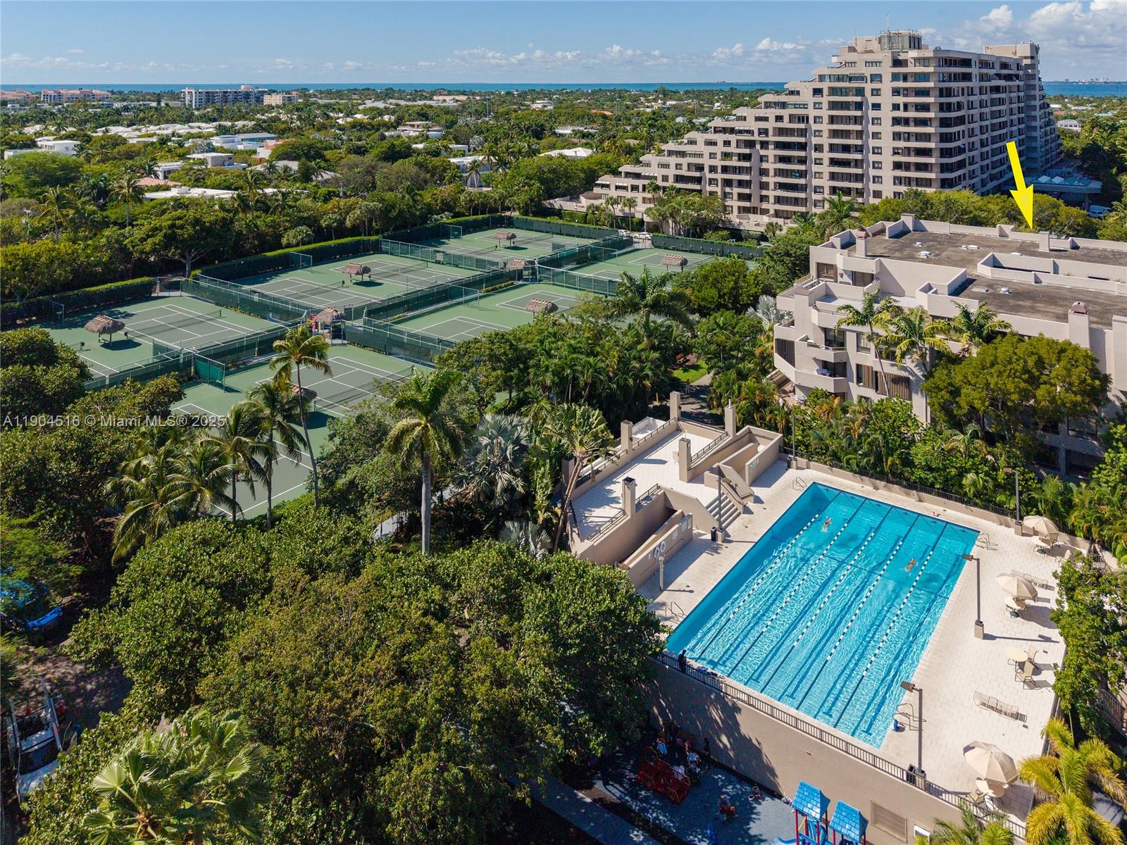 161 Crandon Boulevard, Unit 419 Key Biscayne, FL 33149 - Photo 22 of 35 an aerial view of multiple house