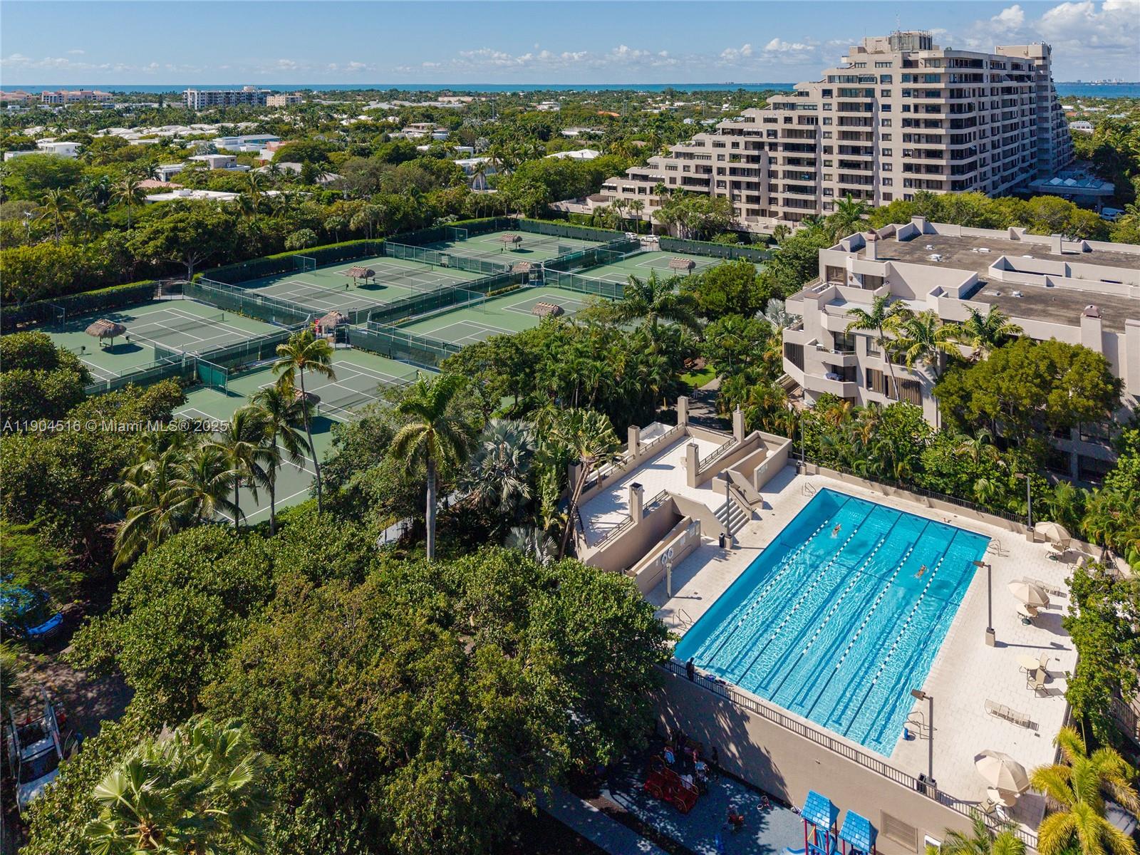 161 Crandon Boulevard, Unit 419 Key Biscayne, FL 33149 - Photo 23 of 35 an aerial view of multiple house