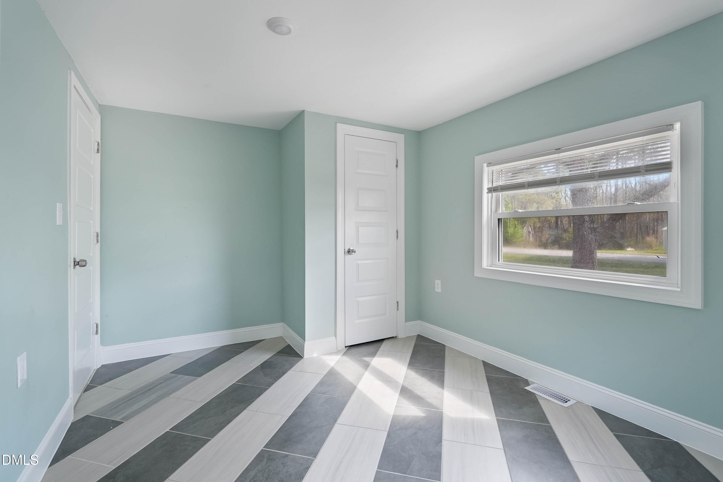 4077 Vass-Carthage Road Carthage, NC 28327 - Photo 23 of 23 a view of a room with wooden floor and window