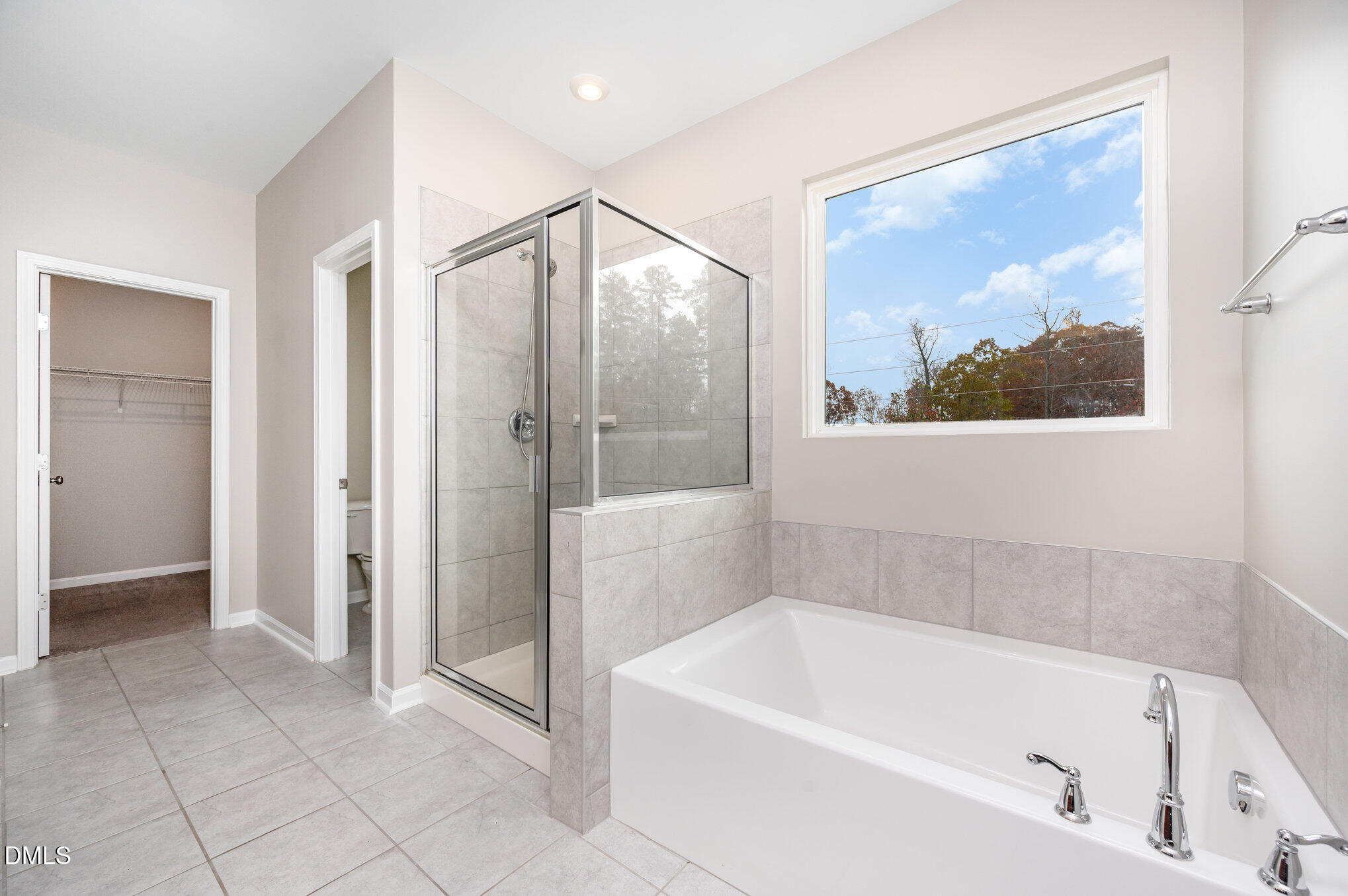 18 Dover Ridge Court Chapel Hill, NC 27517 - Photo 25 of 40 a bathroom with a tub and shower