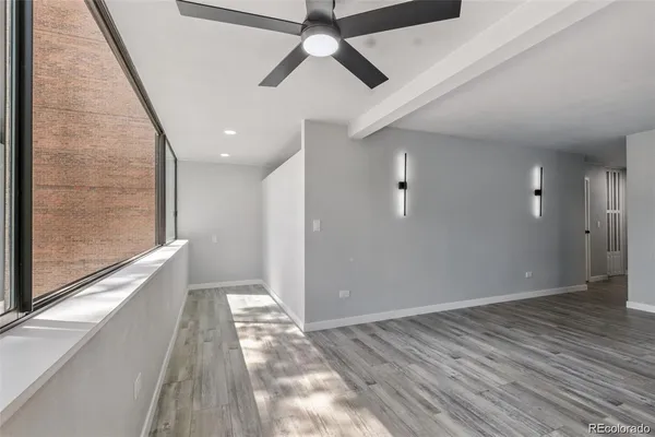 a view of an empty room and window