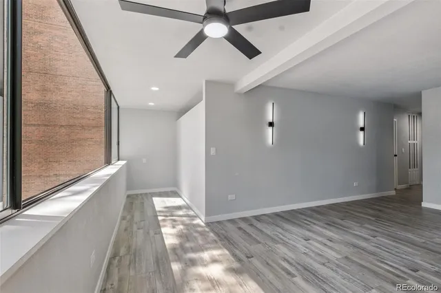 a view of an empty room and window