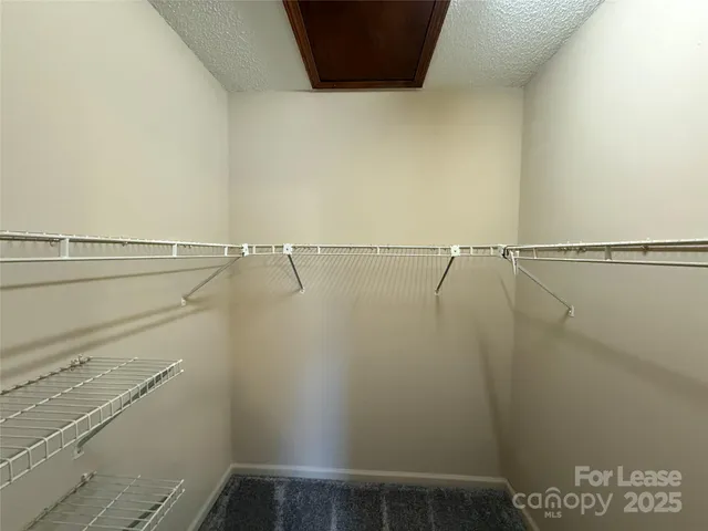 a view of small space with racks on the wall